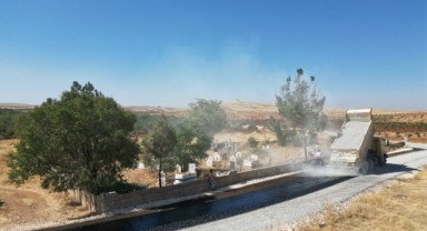 Büyükşehir’den Bozova’da sathi asfalt çalışması (video)